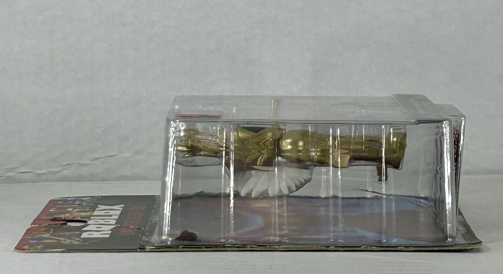 Roblox Simoon68 Golden God 3.5 in Action Figure Pkg Top RT Corner Damaged