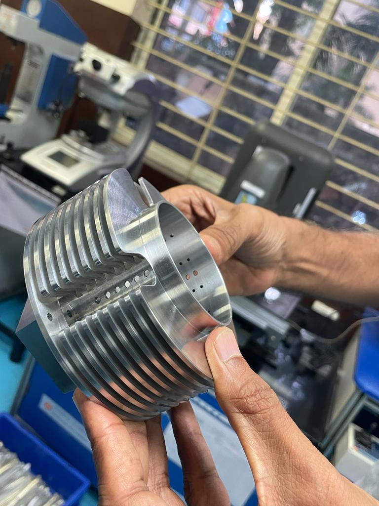 Precision machined aluminium component held at the ELCIA facility