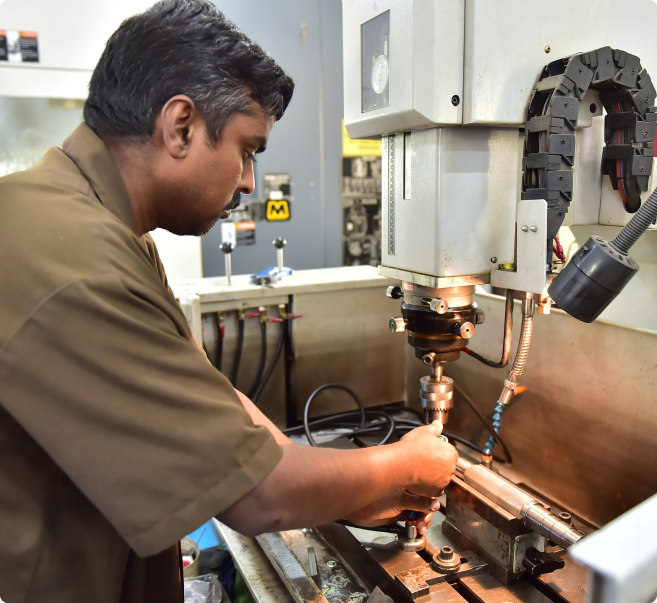 Engineer performing precision machining
